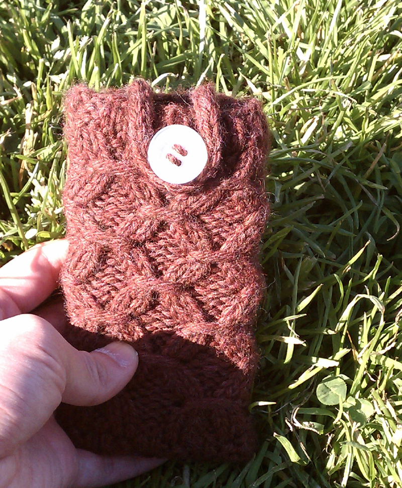Purple heather wool cozy around Android phone